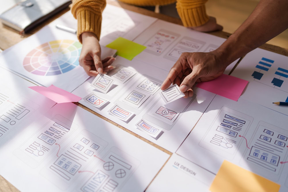 UX researchers and designers working in a UX research agency